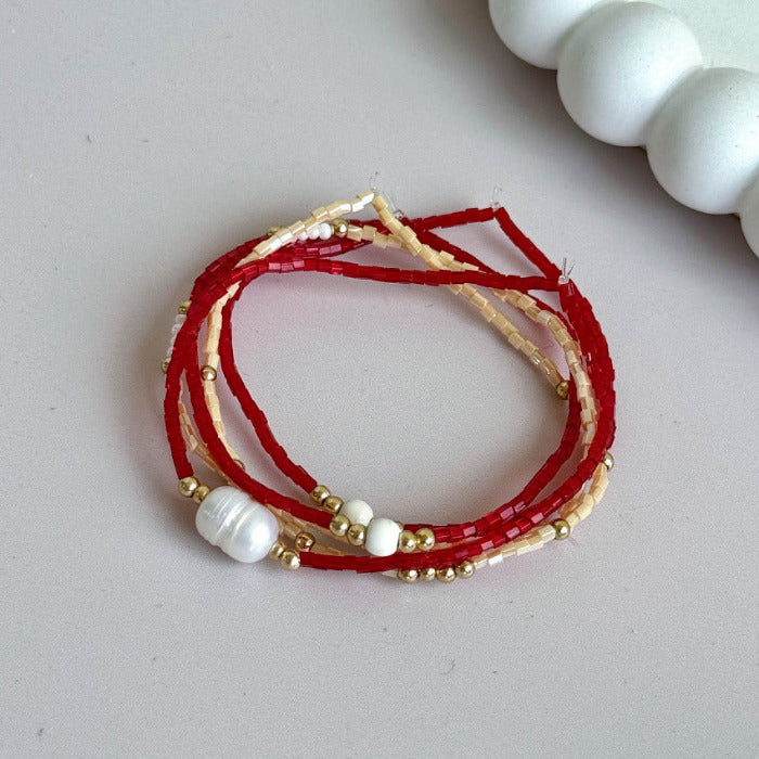 Red & Beige Stack Bracelets