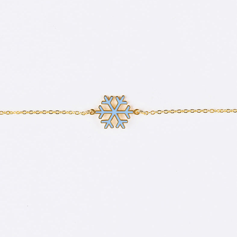 Enamel snowflake bracelet
