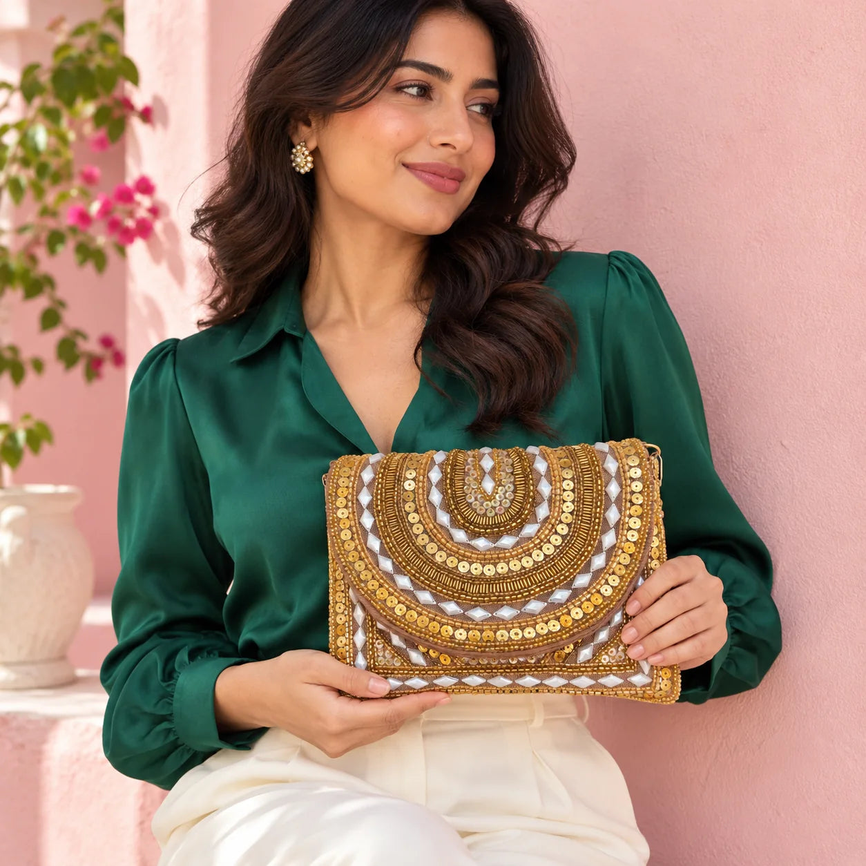 Ruby Beaded Clutch held with an outfit