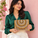 Ruby Beaded Clutch held with an outfit
