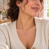 Butterfly Enamel Necklace — close-up with the same model, outfit and setting