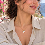 Panda Enamel Necklace — close-up with the same model, outfit and setting