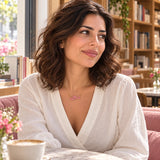 Arabic Name Enamel Necklace — worn in a natural lifestyle setting