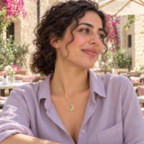 Oriental Moon Enamel Necklace — worn in a natural lifestyle setting