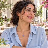 Purple Octopus Enamel Necklace — worn in a natural lifestyle setting
