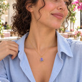 Purple Octopus Enamel Necklace — close-up with the same model, outfit and setting