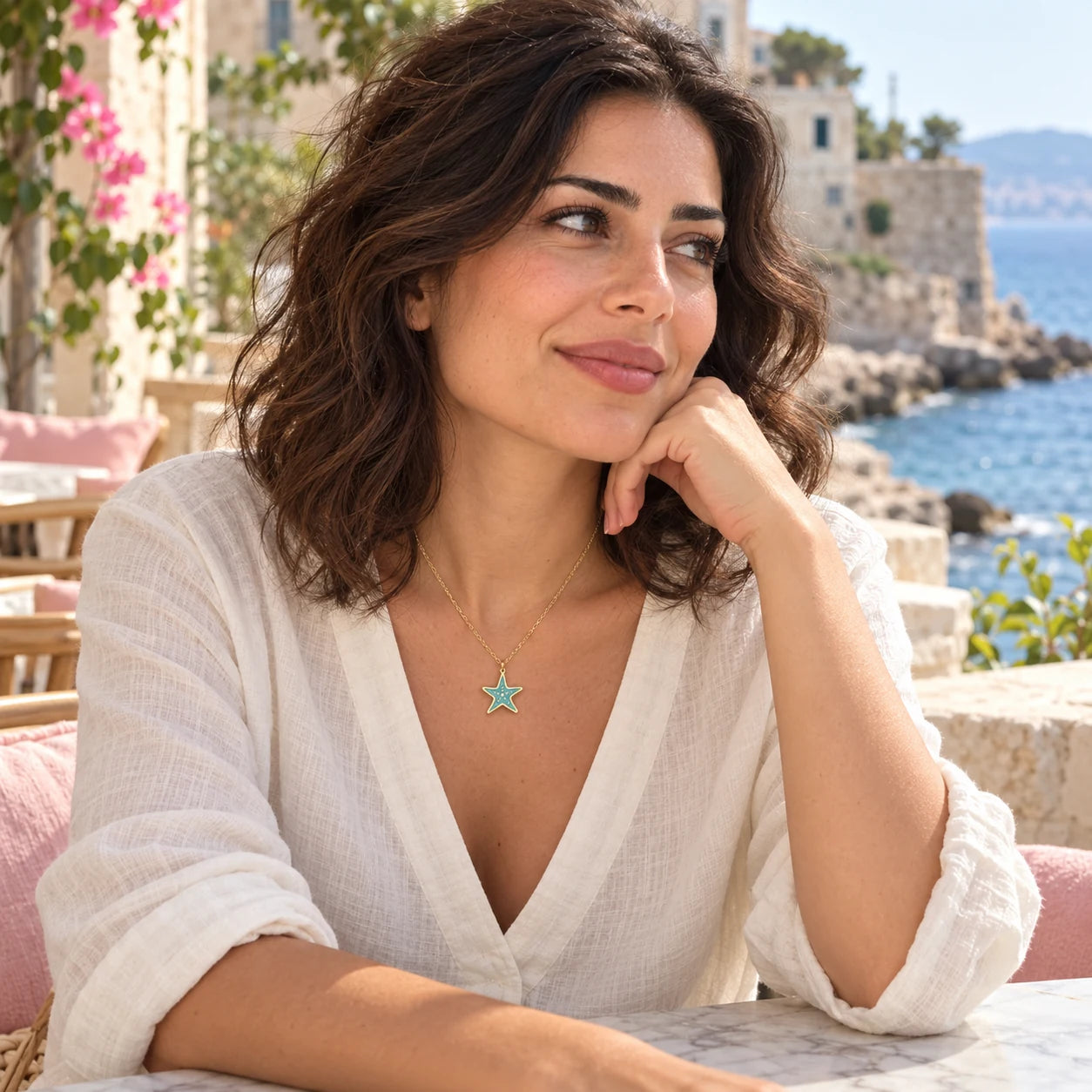 Aqua Star Enamel Necklace — worn in a natural lifestyle setting