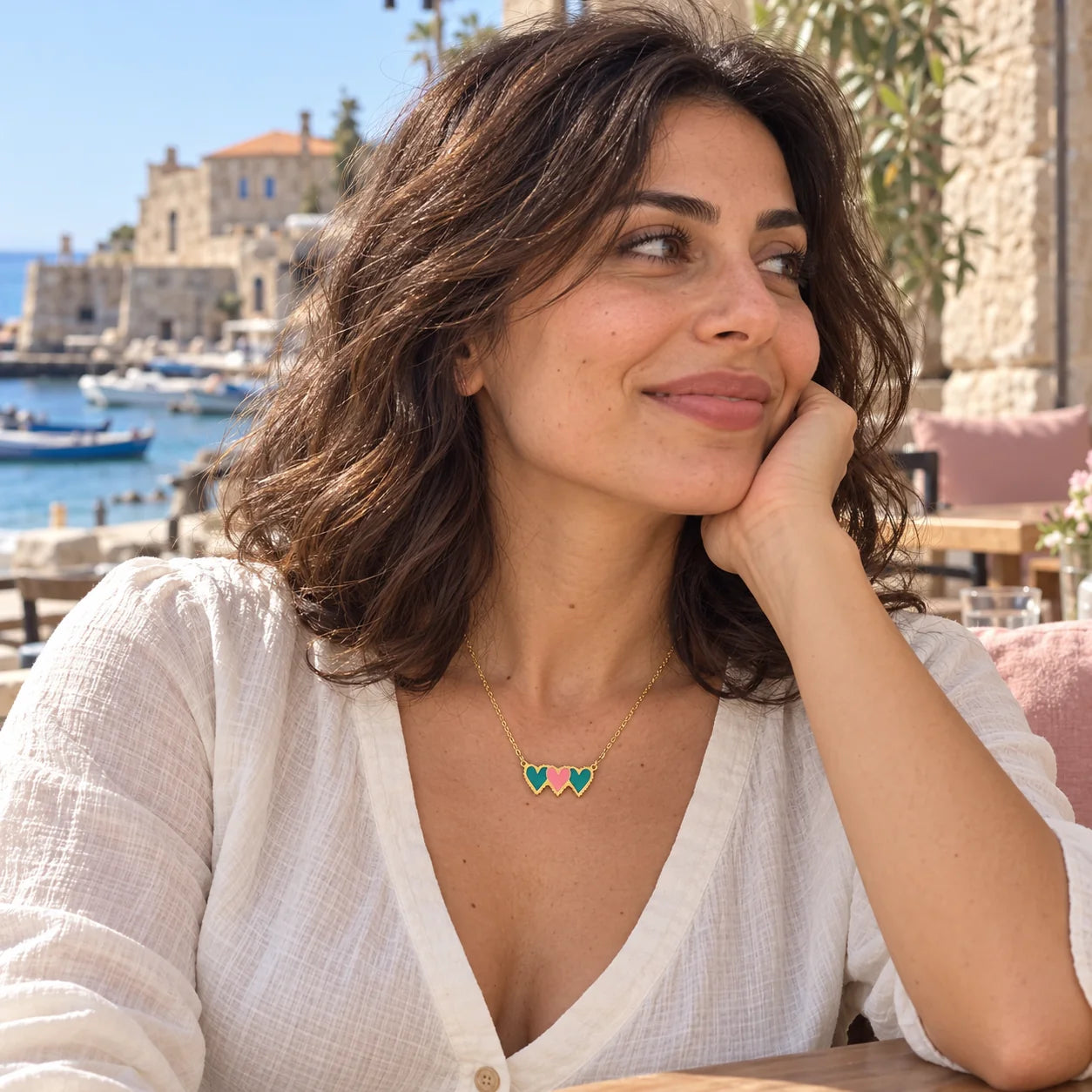 Hearts Enamel Necklace — worn in a natural lifestyle setting