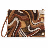 Sandy beaded clutch with brown, bronze, cream and gold wave pattern on white.